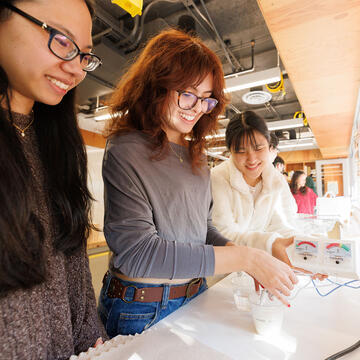 Students present a project at the fall 2025 Exhibition of Student Engineering Work