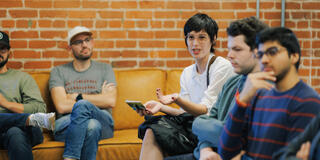 Jacqueline Valadez ’24, third from right, asks a question at a Ubisoft panel discussion.