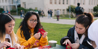 Students folding paper