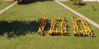 students in the shape of a 100