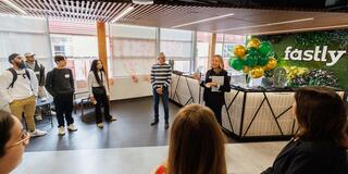 Students listening to a person speaking at Fastly