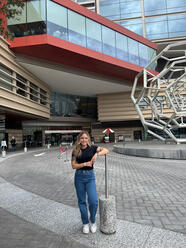 Felicia Mitchell in front of a hospital