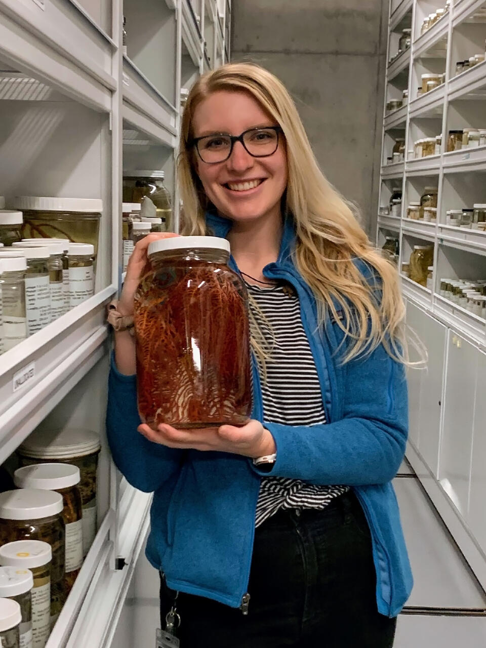 Johanna Loacker holds a jar of samples.