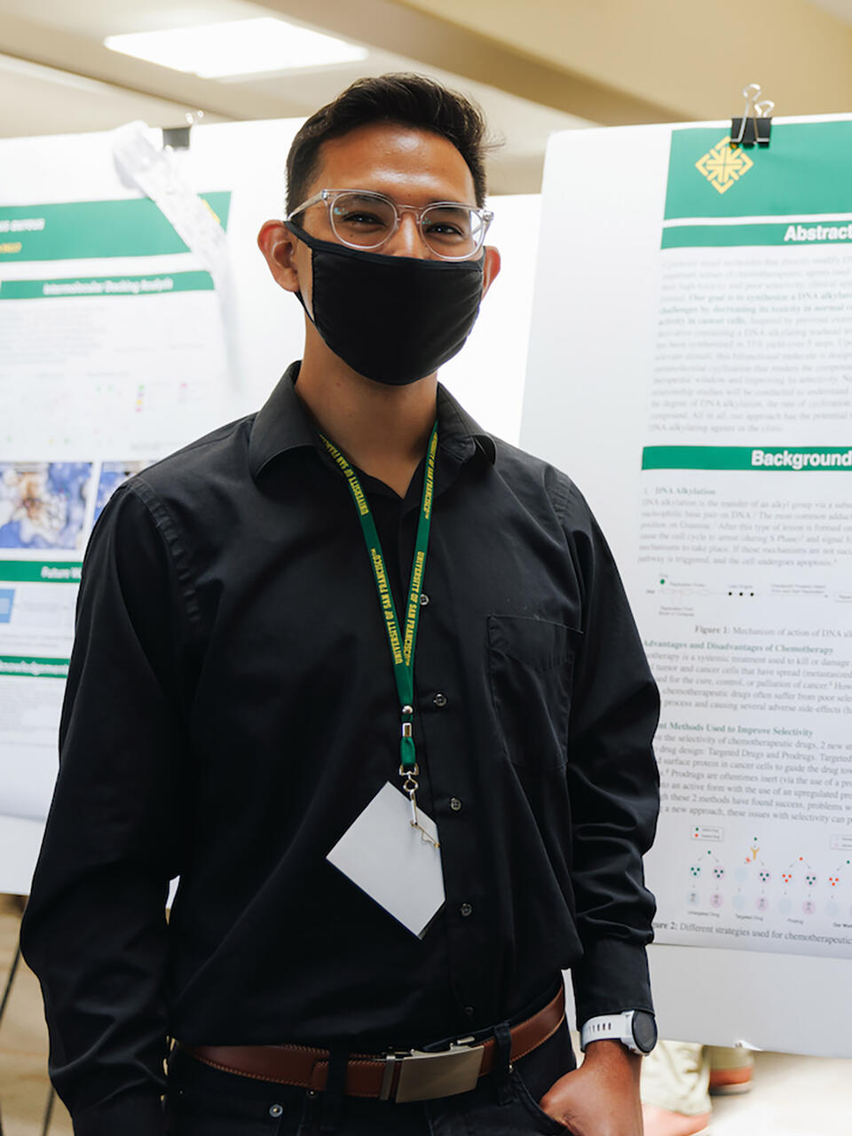 Samuel Jocobo standing in front of presentation.