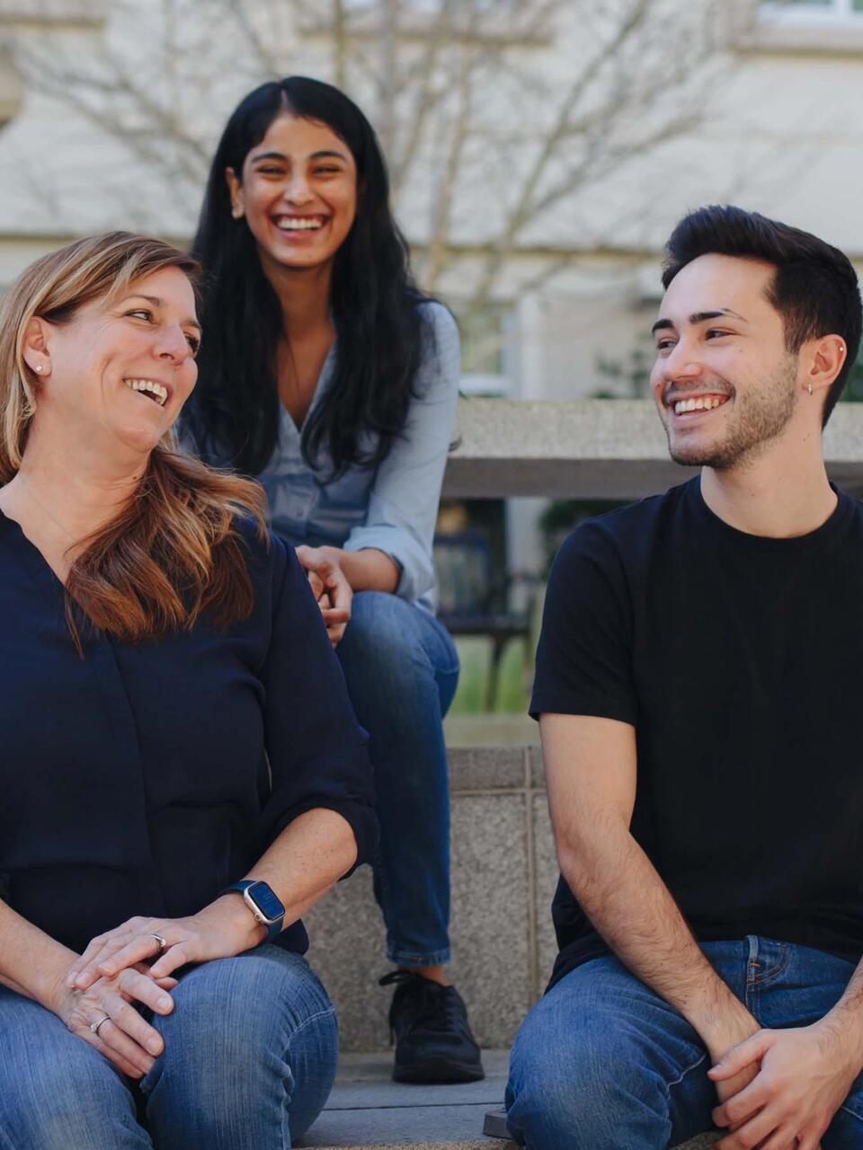 Professor Christina Tzagarakis-Foster talks with her students